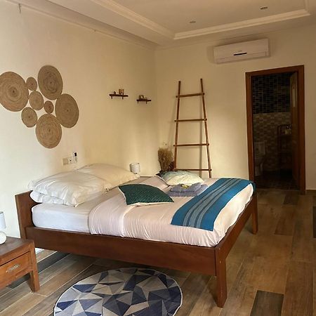 L'Oasis Guesthouse Cotonou Eksteriør billede